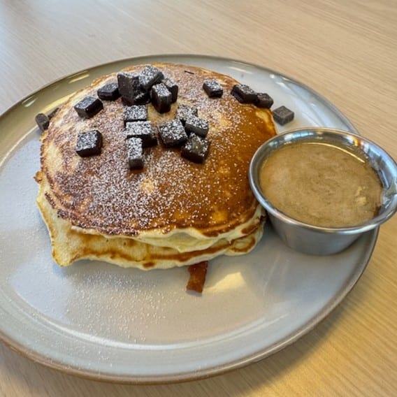 3 CHOCOLATE CHUNK PANCAKES Served with/Maple Butter.